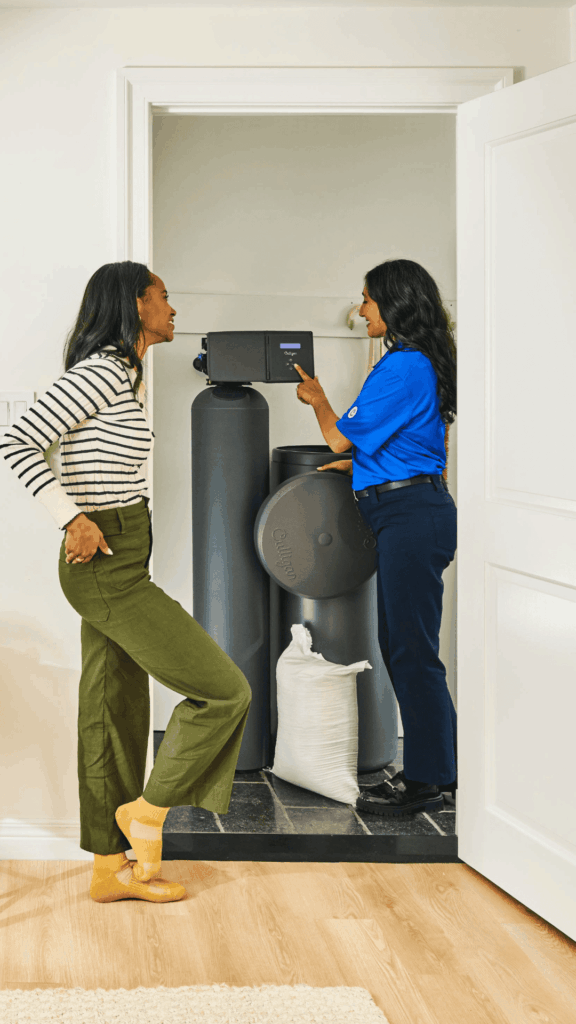 woman servicing water softener